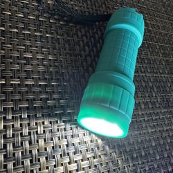 Small turquoise LED flashlights