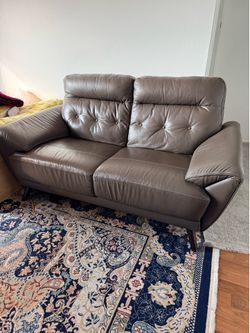 Real leather loveseat for 50$