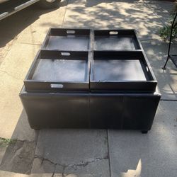 Black ottoman with removable trays