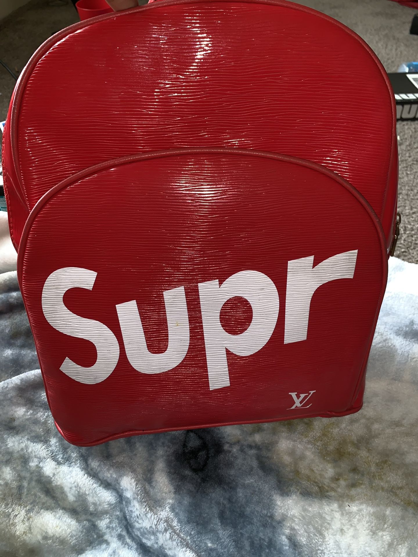 Lois Vuitton Supreme backpack