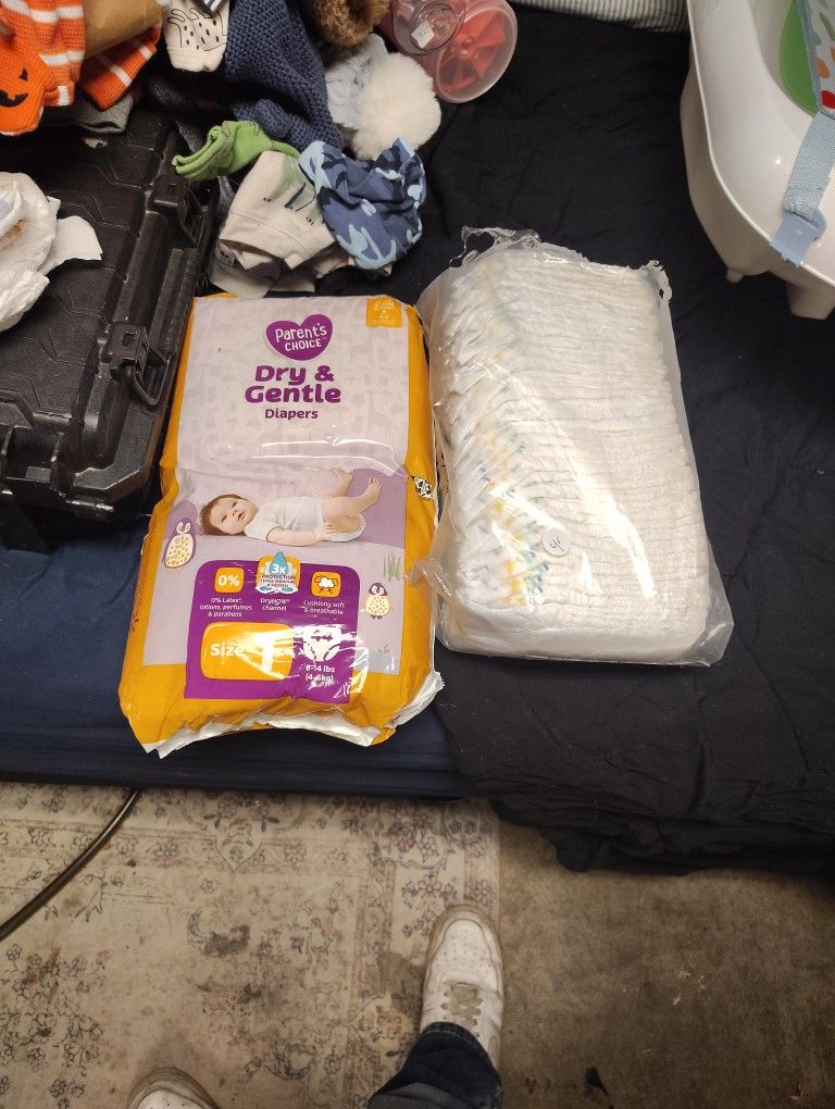 Size 1 Diapers And 10 Newborn Diapers Just Make Any Offer