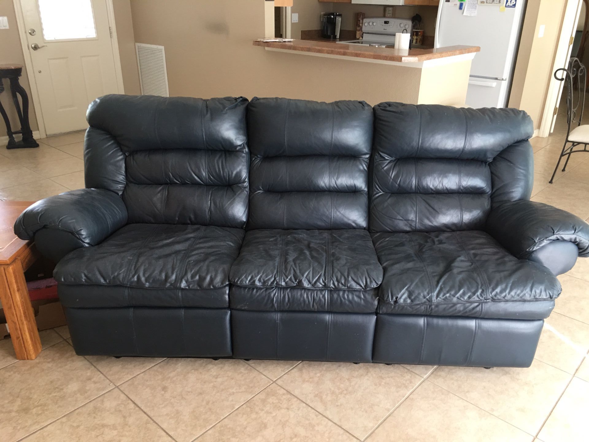 Leather dual reclining couch