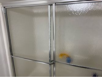 Bathtub sliding glass with frame