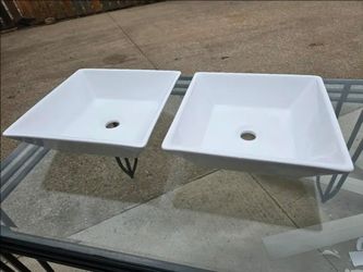 2 new white vessel sinks