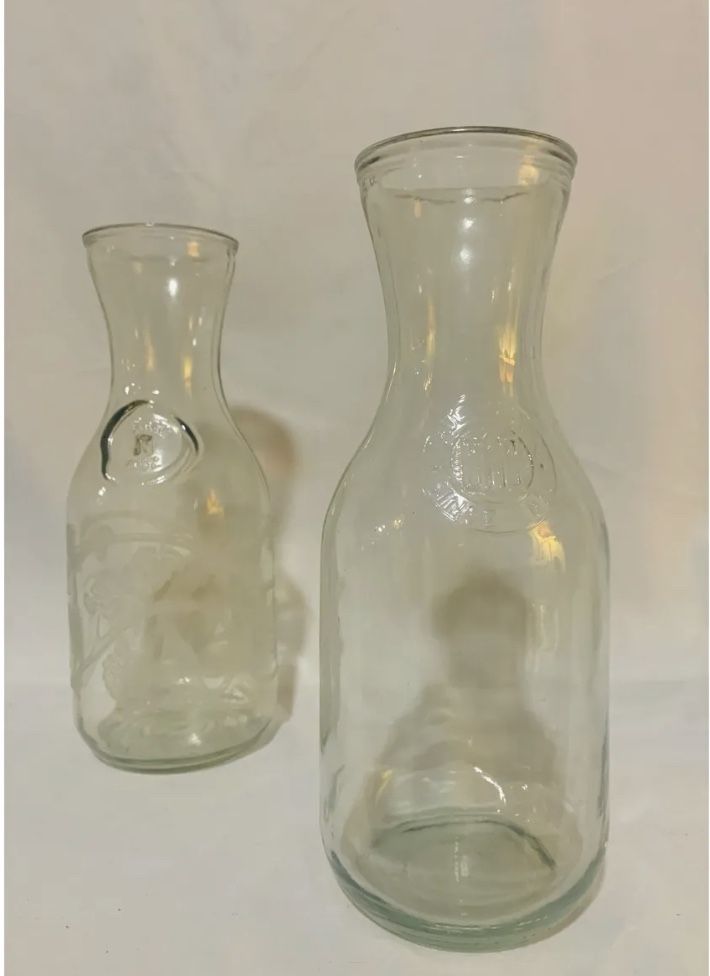 Two Antique Glass Milk Bottles