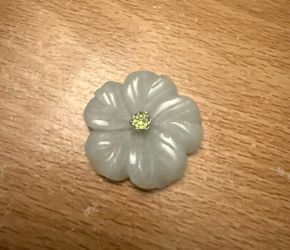 Jade authentic flower with centered stone $10
