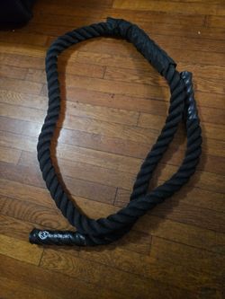 Rhinorope heavy fitness training rope, designed for high-intensity full-body conditioning and grip strength workouts.
