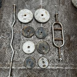 Curl Bar , Tricep Bar And 100lbs Of Plates 