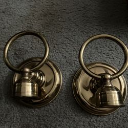 two brass candle holders and the vintage baking pan