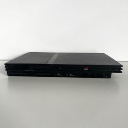 PS2 Slim (Not Working) Bundle – Games, Cords, & Controllers Included