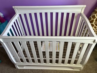 Delta convertible crib to a bed