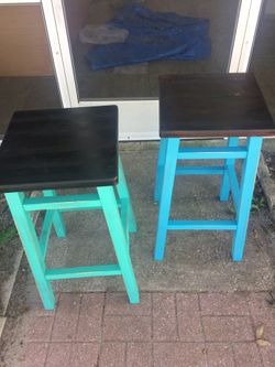 Pair of teal and dark stained stools
