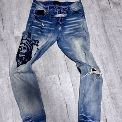 Amiri X WES LANG REAPER LOGO