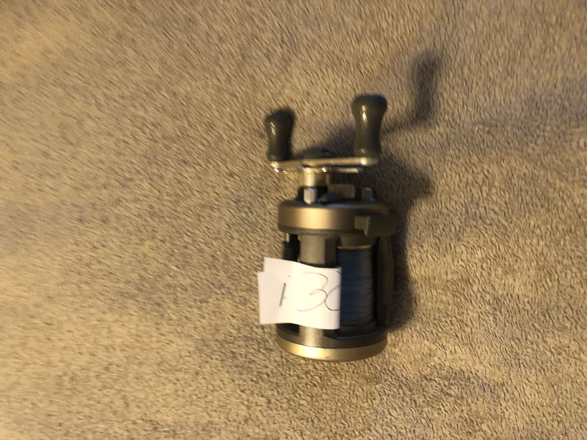Quantum iron ir310 in perfect condition baitcater fishing reel