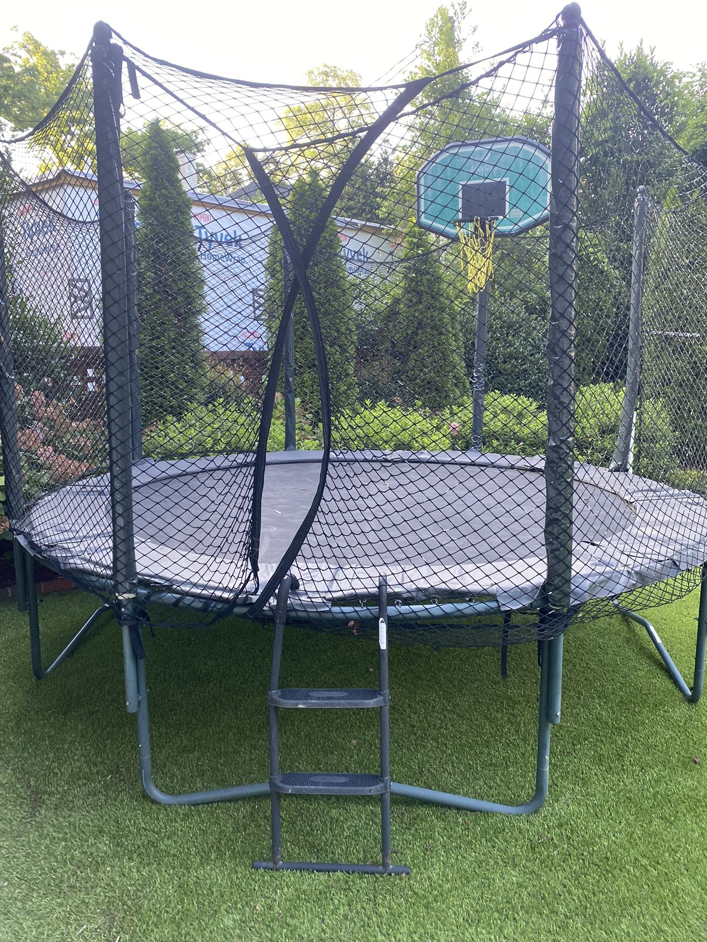Large Outdoor Trampoline with Safety Enclosure & Basketball Hoop - Great Family Fun!