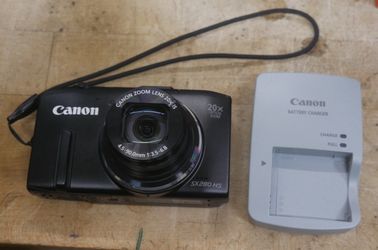 Canon Powershot SX280 HS Black 12.1MP Digital Camera w charger and battery used. tested. in  a good working order. F(contact info removed)2.