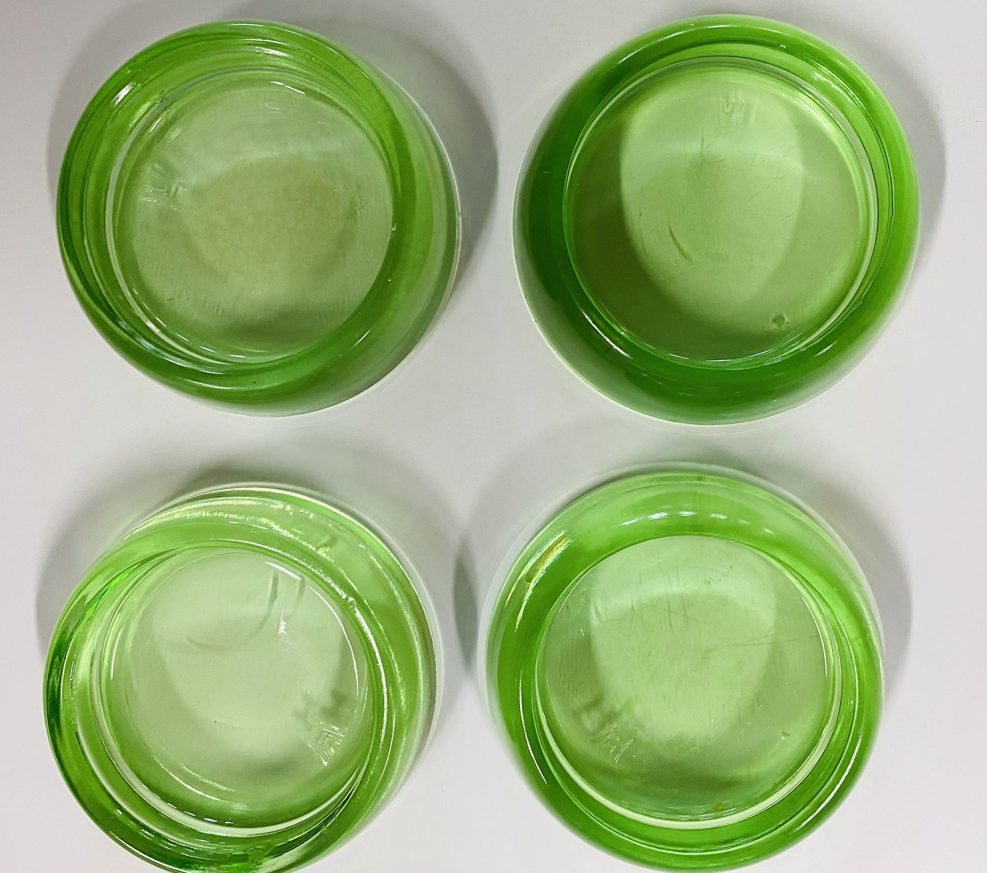  Vintage Lot of 4  Hazel Atlas Green Uranium Glass Furniture Coasters Slides -  20  dollars