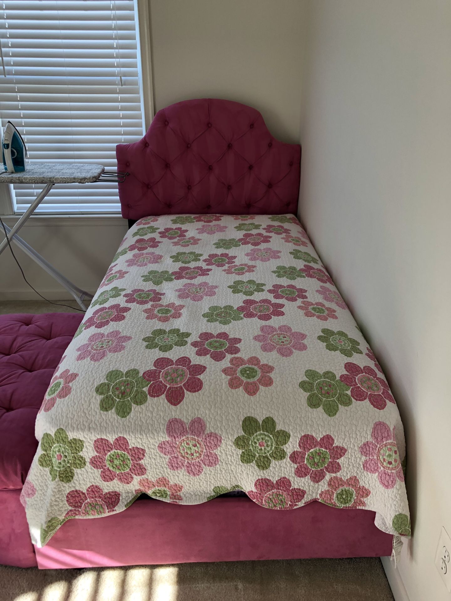 Pink tufted bed, ottoman, organic mattress set and decorations