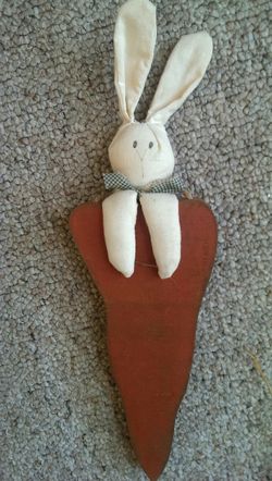 Bunny on wooden carrot