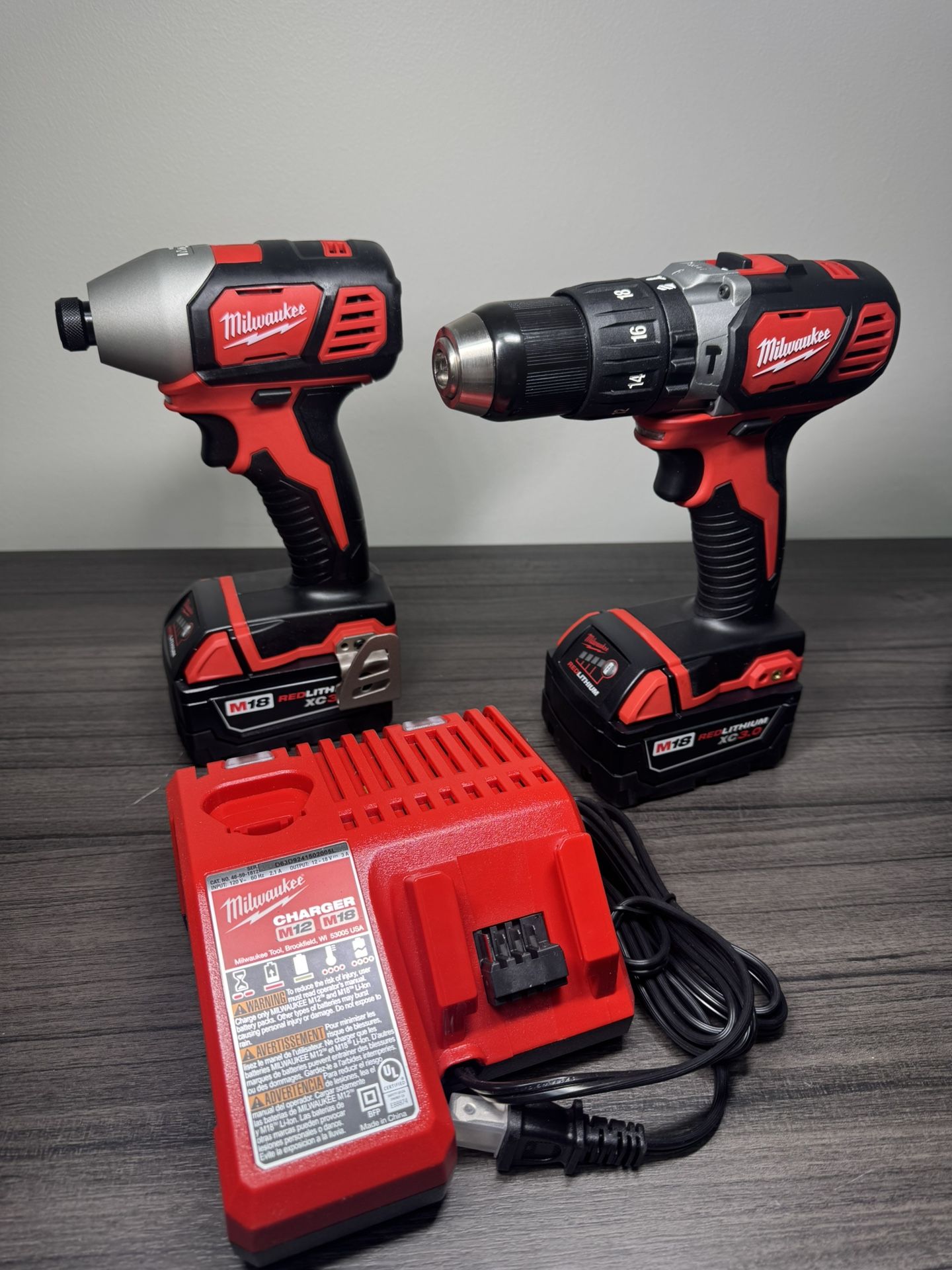Milwaukee M18 Hammer drill 1/2” & Impact Driver 1/4” Kit with Two 3.0Ah Batteries, 1-Charger