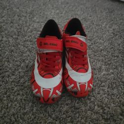 SNEL IENIAO" kids' soccer cleats.