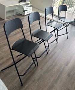IKEA wooden Franklin black chairs