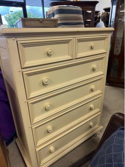 5-drawer chest in an antique parchment finish - 38” x 19” x 50”