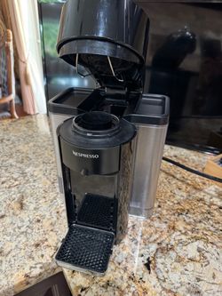 Nespresso Coffee and Espresso Machine in Black, Click 1 time for espresso shot, 3 times for full cup
