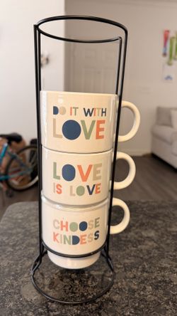 3 coffee mugs with mug holder