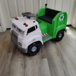 Kid trax real rigs ride on garbage recycling truck.