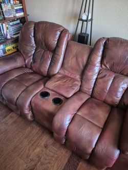 Leather reclining love seat