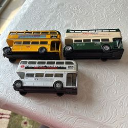 Three  Double Decker Buses. 