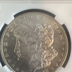 1878 Morgan Silver Dollar – 7 Tail Feathers (7TF)