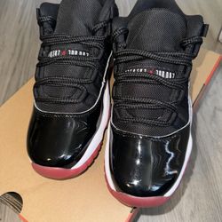 Jordan 11 Low Breads