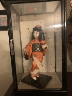 Vintage doll in case