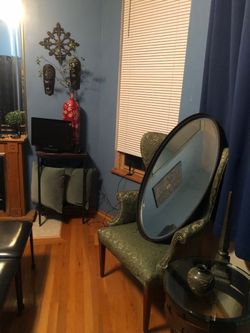 Iron, oval, beveled, mirror