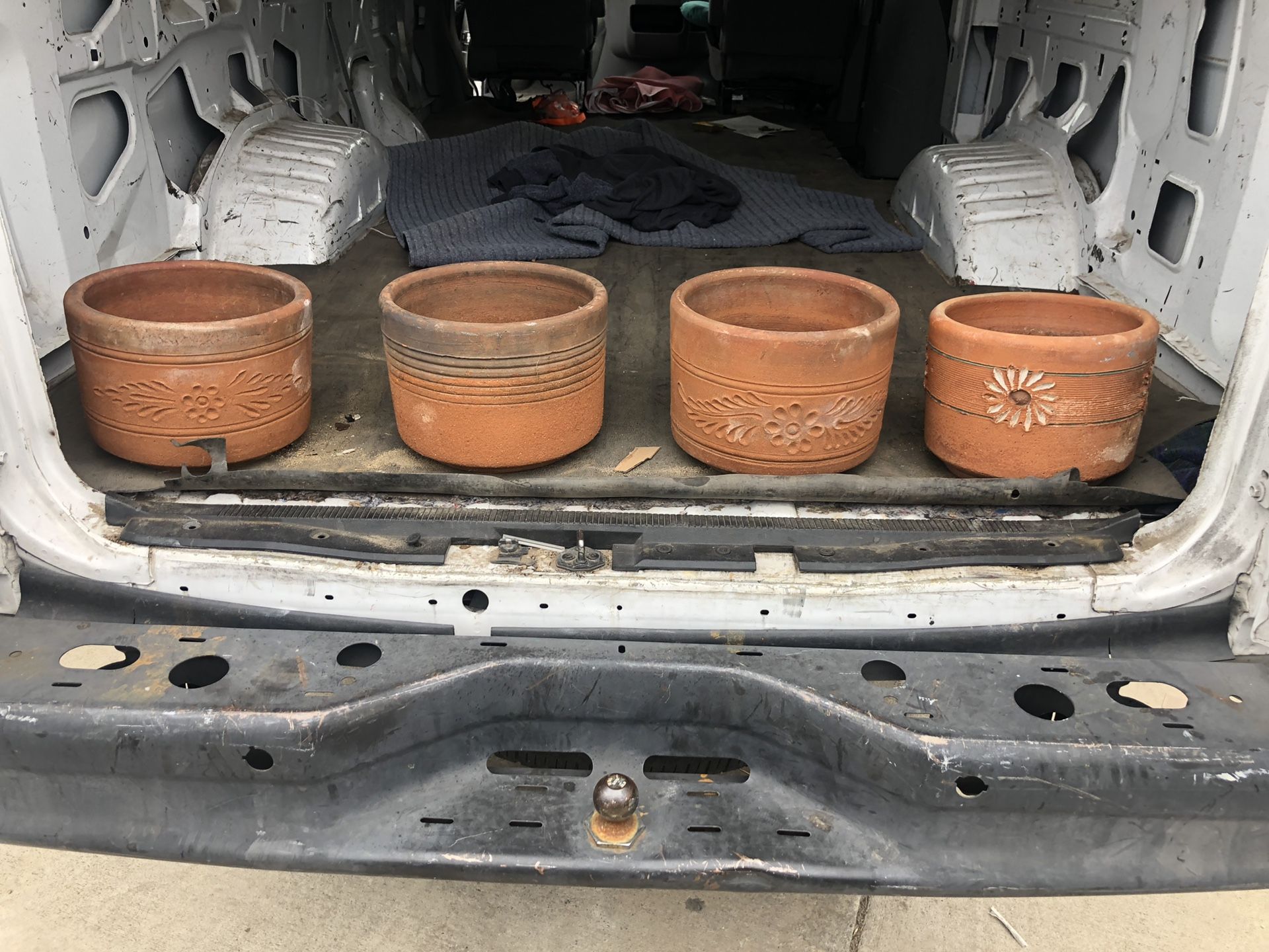 4 Terra-cotta flower pots