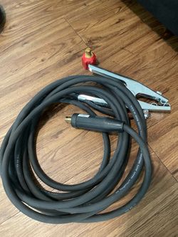 Welding ground clamp with adapter