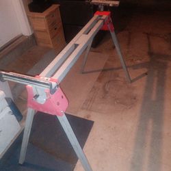 folding saw stand with retractable arms up to 12' of reach