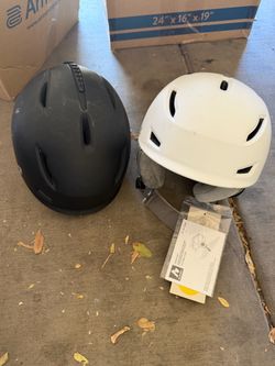Two Ski/Snowboard bicycle Helmets Black vs and White