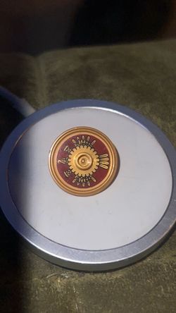 Minifigure, Shield Circular / Round Rimmed Face with Stud with Dark Red and Gold Aztec Pattern