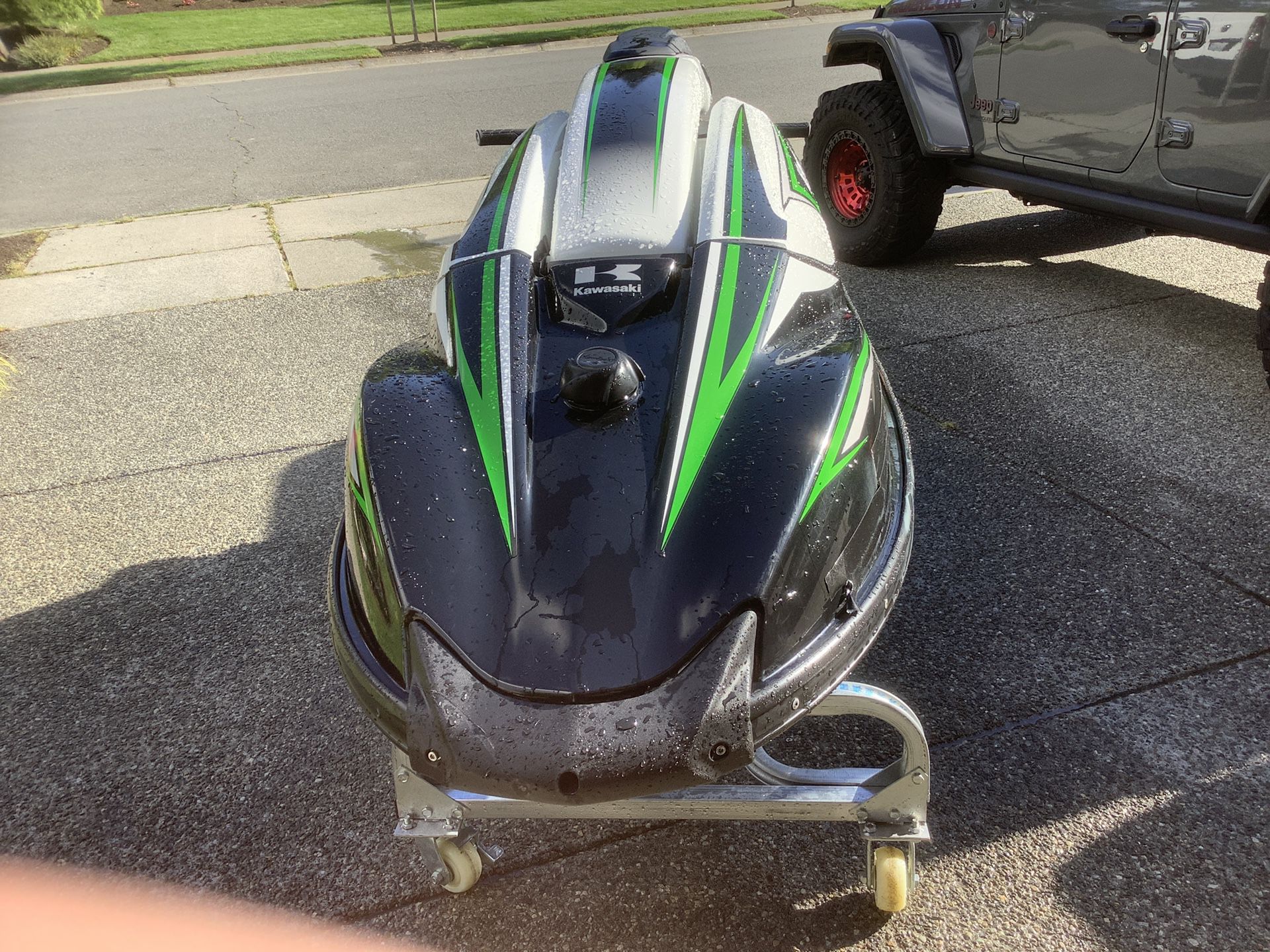 Kawasaki 1500 sxr 1000 in upgrades plus 1000 aluminum trailer included Cart also included trailer is Triton one place aluminum trailer jet ski
