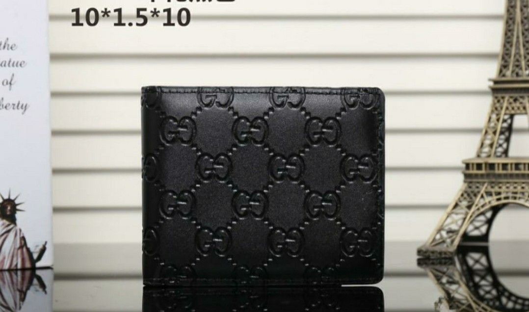 GG WALLETS 5 DIFFERENT COLORS AVAILABLE.......