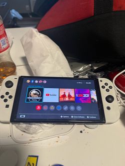 Nintendo switch oled comes with dock station