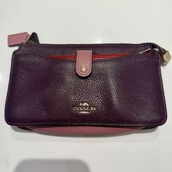 Coach dark purple leather wristlet with gold hardware ✨