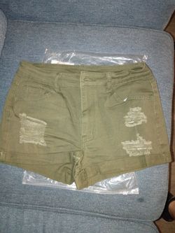 Green cut up shorts