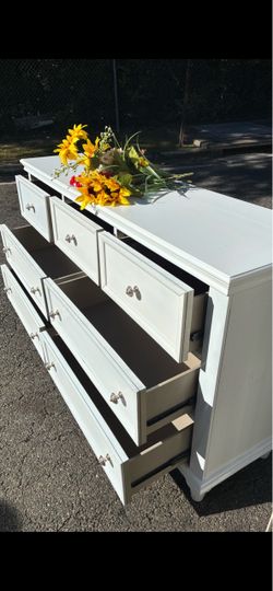 Modern solid wood white long dresser with big drawers. Drawers sliding smoothly . Delivery available