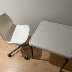 Small Foldable table with comfortable chair.