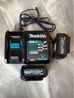 New Makita XGT 40V max battery and charger set. (2pack) Battery 2.5Ah Li-ion. Charger . Makita XGT tools.   Price is firm $150