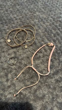 Sloth bracelet, 3 bracelets, and a ring , all 1.00, all 3 bracelets together 1.00